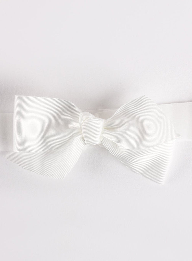 Buy Bow Headband in White | Trotters Childrenswear